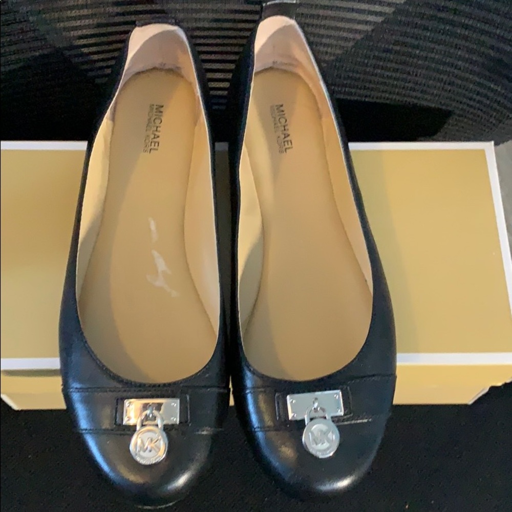 MK black flat shoes